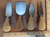 Set of four cheese tools with beautiful beechwood handles.